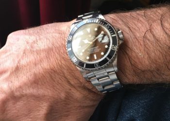 rolex submariner date on wrist